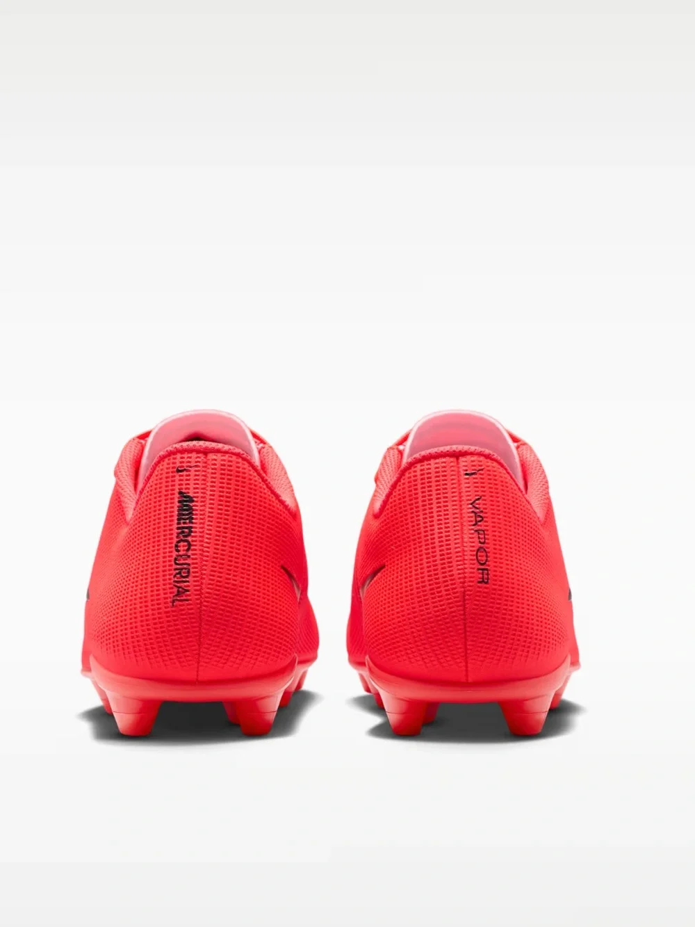 Nike Women’s Red Soccer Cleats with Gold Swoosh Accent